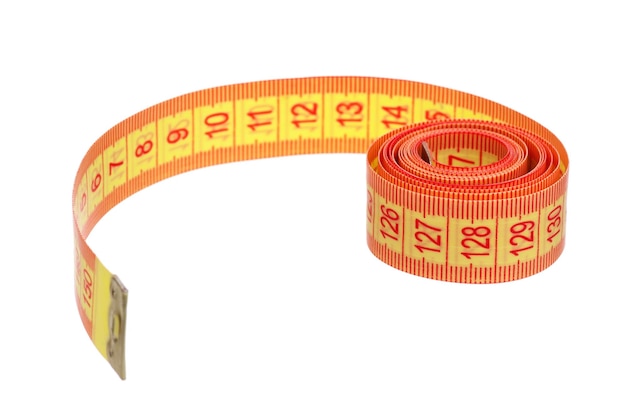 Measuring tape of the tailor over white background