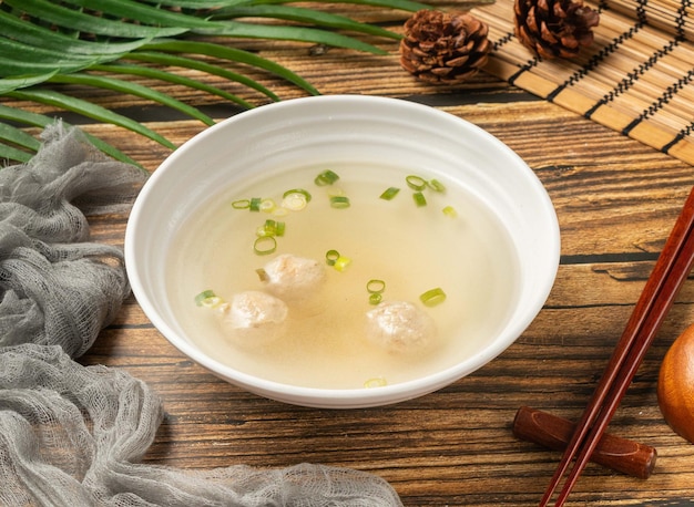 Meat Ball Soup served in bowl isolated on table top view of taiwan food