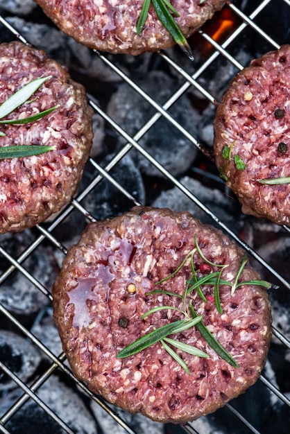 Meat Burgers Grilled on Charcoal Grill BBQ Close Up View