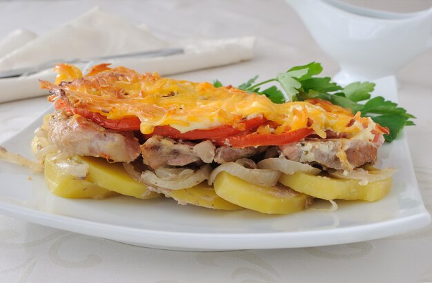 Meat and cheese with potatoes