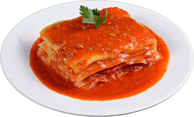 Meat lasagna with tomato sauce in white plate isolated on white background