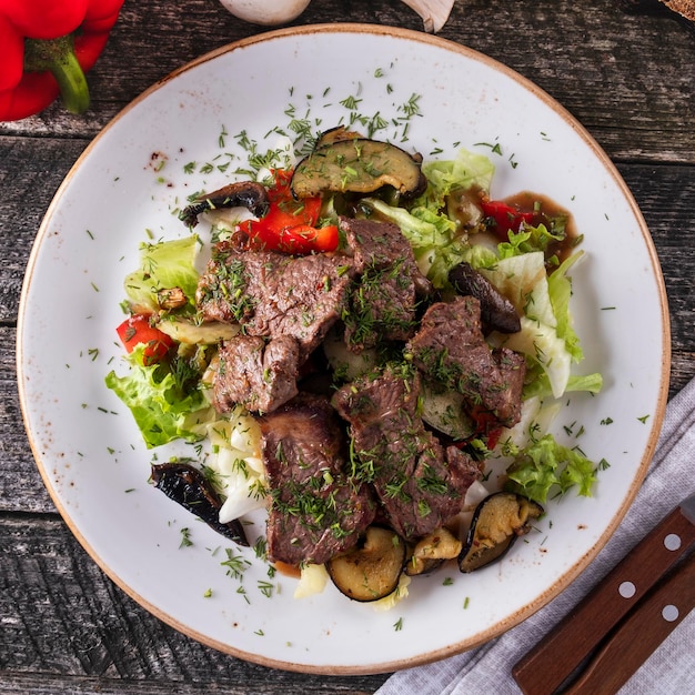 Meat salad with fresh vegetables Top view Closeup