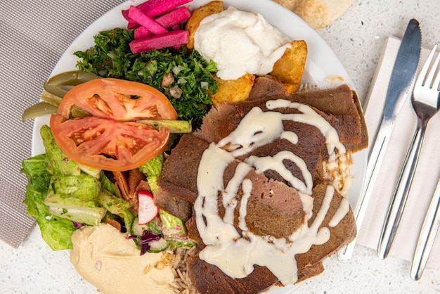 Meat Shawarma Doner on a plate Meat Shawarma plate isolated on white background