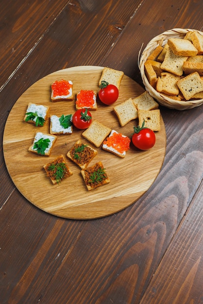 Meat spread on toasted bread with greens Fresh delicious croutons made from whole grain bread