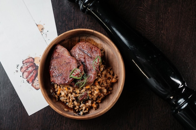 Meat with spelt Concept of restaurant serving dishes