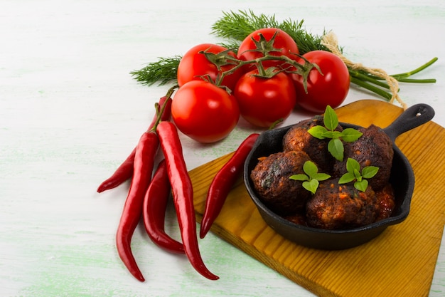 Meatballs  in a cast iron skillet