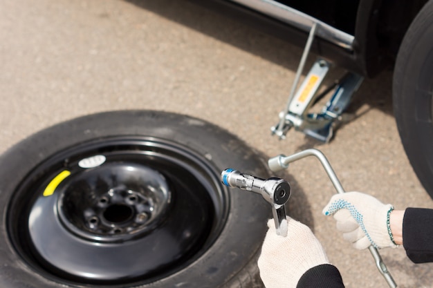 Mechanic changing a car tire