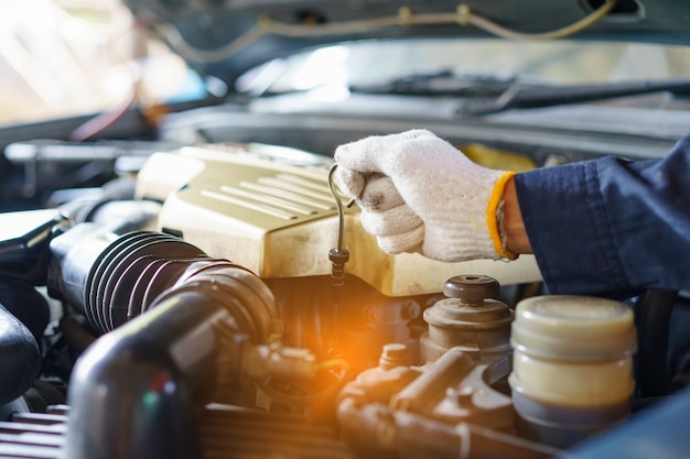 Mechanic with Stainless Steel Wrench in Hand