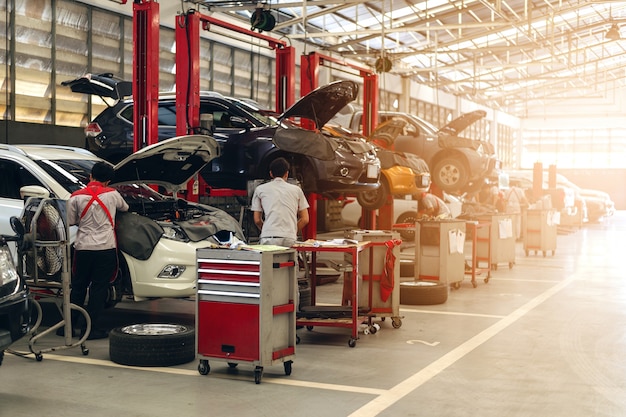 Mechanic working car maintenance 