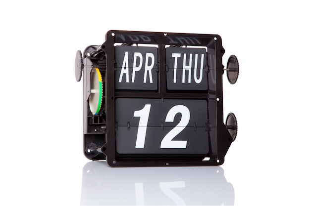 Mechanical calendar retro date 12 April, on isolated International Day of Human Space Flight.