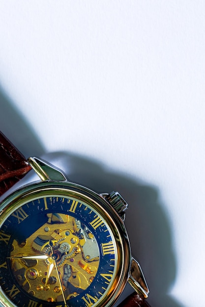 mechanical watch on a white background,Automatic Men Watch With Visible Mechanism On White