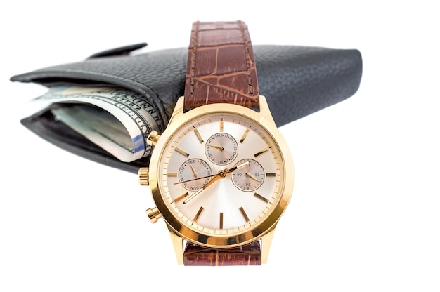 Mechanical wrist watch and wallet with money on a white