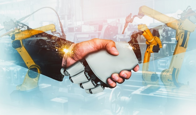 Mechanized industry robot and human worker working together in future factory