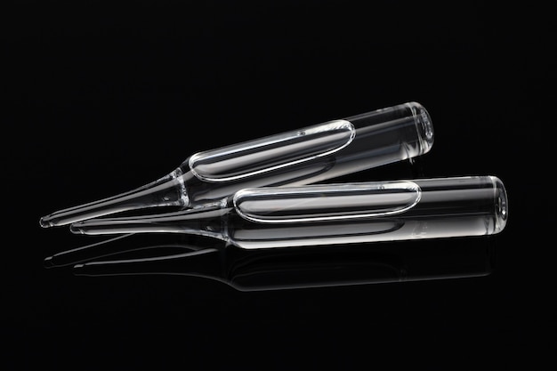 Medical ampoules for injection on dark surface