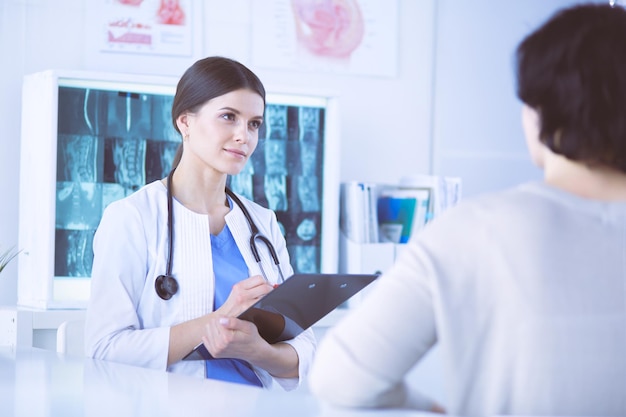 Medical consultation in a hospital Doctor listening to a patient's problems