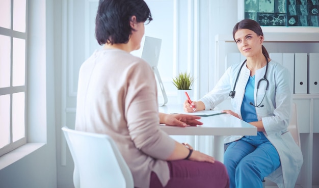 Medical consultation in a hospital Doctor listening to a patient's problems