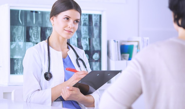 Medical consultation in a hospital Doctor listening to a patient's problems