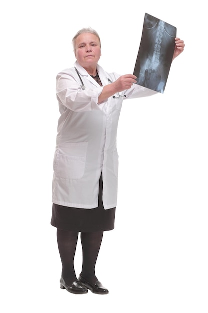 Medical doctor analysing xray image looking at camera and smiling