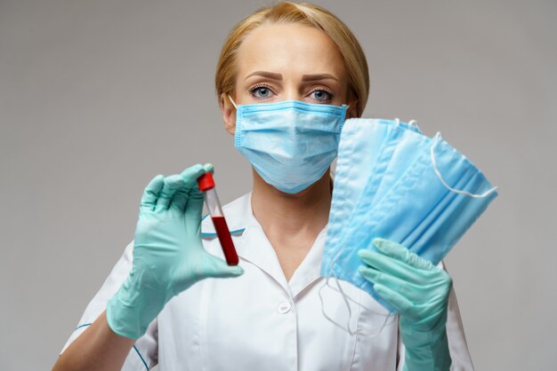 medical doctor nurse woman wearing latex gloves