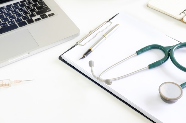 Medical equipment on work table with stethoscope.