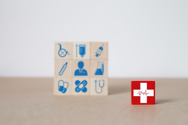 Medical and Health on wooden toy block.