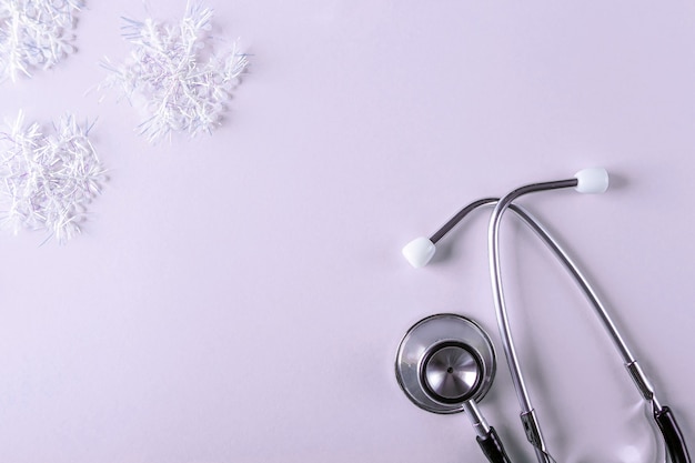 Medical New year composition with stethoscope and Christmas decoration