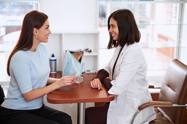 Medical person listening to her client question