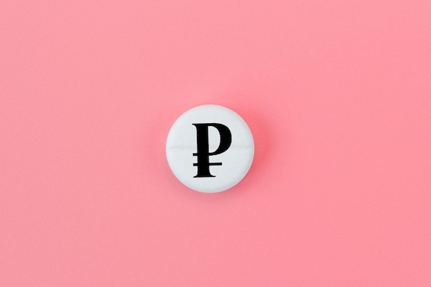 Medical pill with ruble currency sign on a pink background Rise in the price of medicines Expensive medicine in Russia