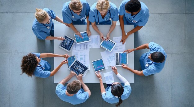 Photo medical professionals collaborating around a table analyzing data and report in a modern healthcare