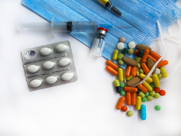 Medical supplies on a white background, pandemic. Selective focus