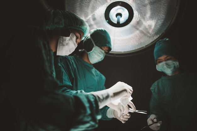 Medical Team Performing Surgical Operation in Modern Operating Room