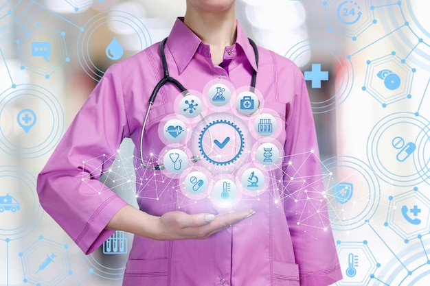 Photo a medical worker shows the structure of medical research on blurred background