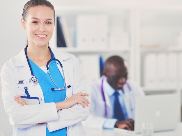 Medicine doctor offering hand to shake in office closeup Doctors