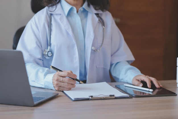 Medicine doctor touching tablet Medical technology and futuristic concept