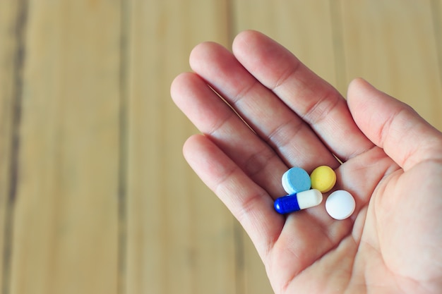 medicine tablets on hand 