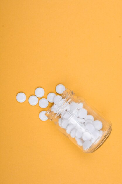 Medicine tablets and pills in and out of bottles Health care