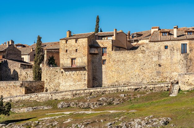 Medieval houses and walls of the old town of Pedraza located on a hill in the fields of Castile Spain