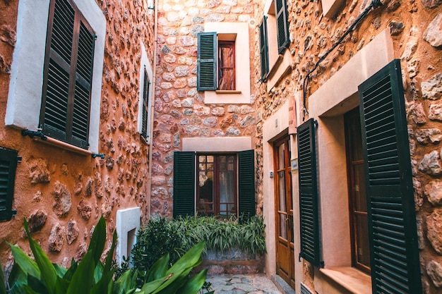 medieval street in the Old Town of the picturesque Spanishstyle village Fornalutx Mallorca