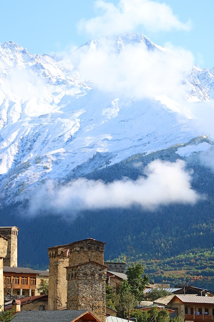 Medieval Svan Tower with Snowcapped Caucasus Mountains Mestia Town Svaneti Region Georgia