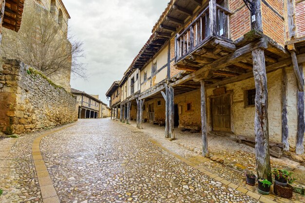 Medieval wooden arcades and balconies hanging in Calatanazor Spain