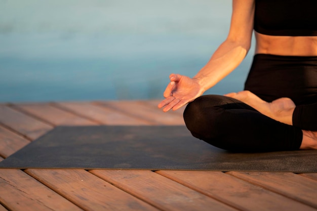 Meditation Concept Cropped Shot Of Woman In Activewear Meditating Outdoors