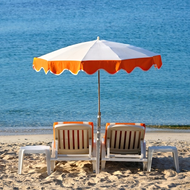 Mediterranean beach chairs sun umbrella square format