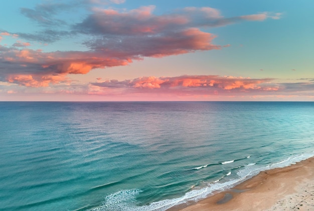 Mediterranean Sea under a colorful sky in La Mata Torrevieja Costa Blanca Spain during sunset