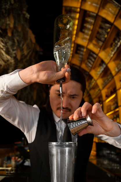 Medium shot bartender preparing drink