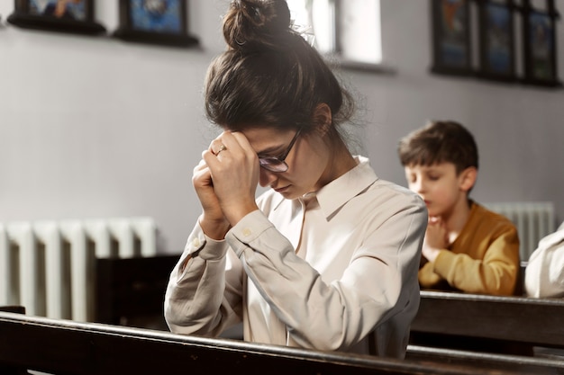 Medium shot christian people praying