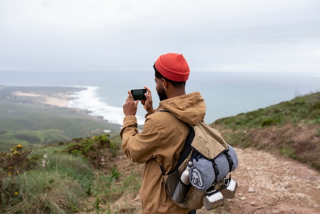 Medium shot man on hiking tour