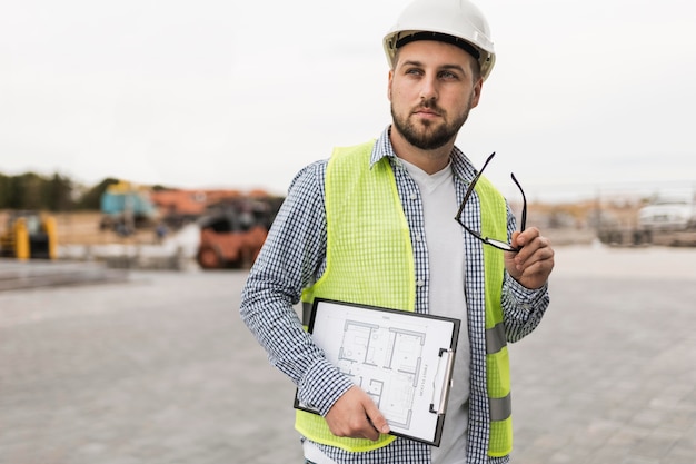 Medium shot man holding glasses