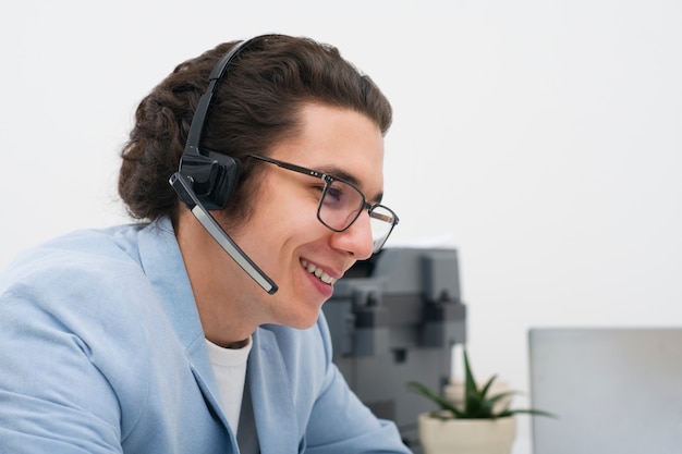 Medium shot man working in office