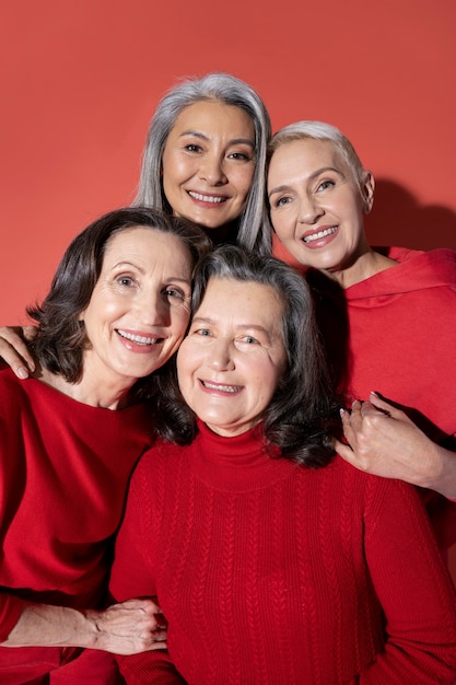 Medium shot senior women posing together