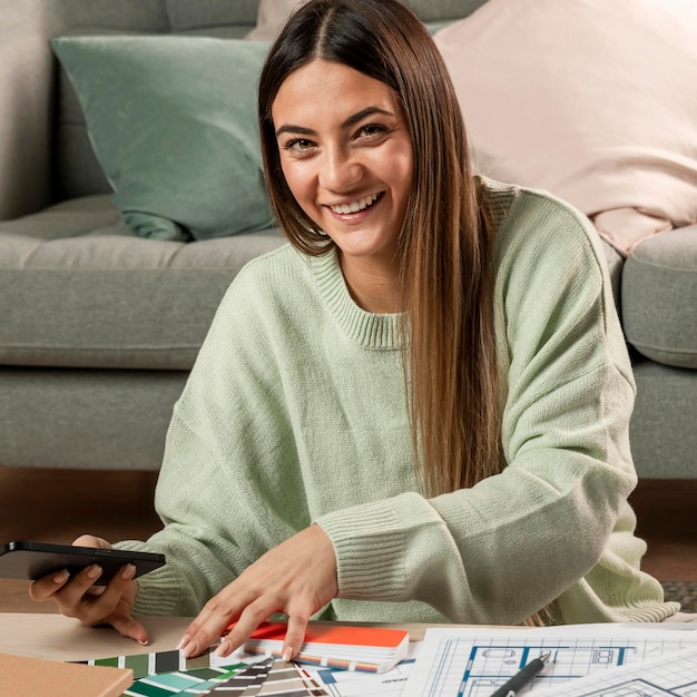 Medium shot smiley woman indoors